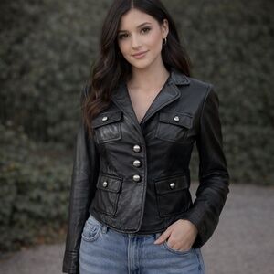 Bebe. Y2K Women's Black Leather Jacket. Great Condition. Size XS.